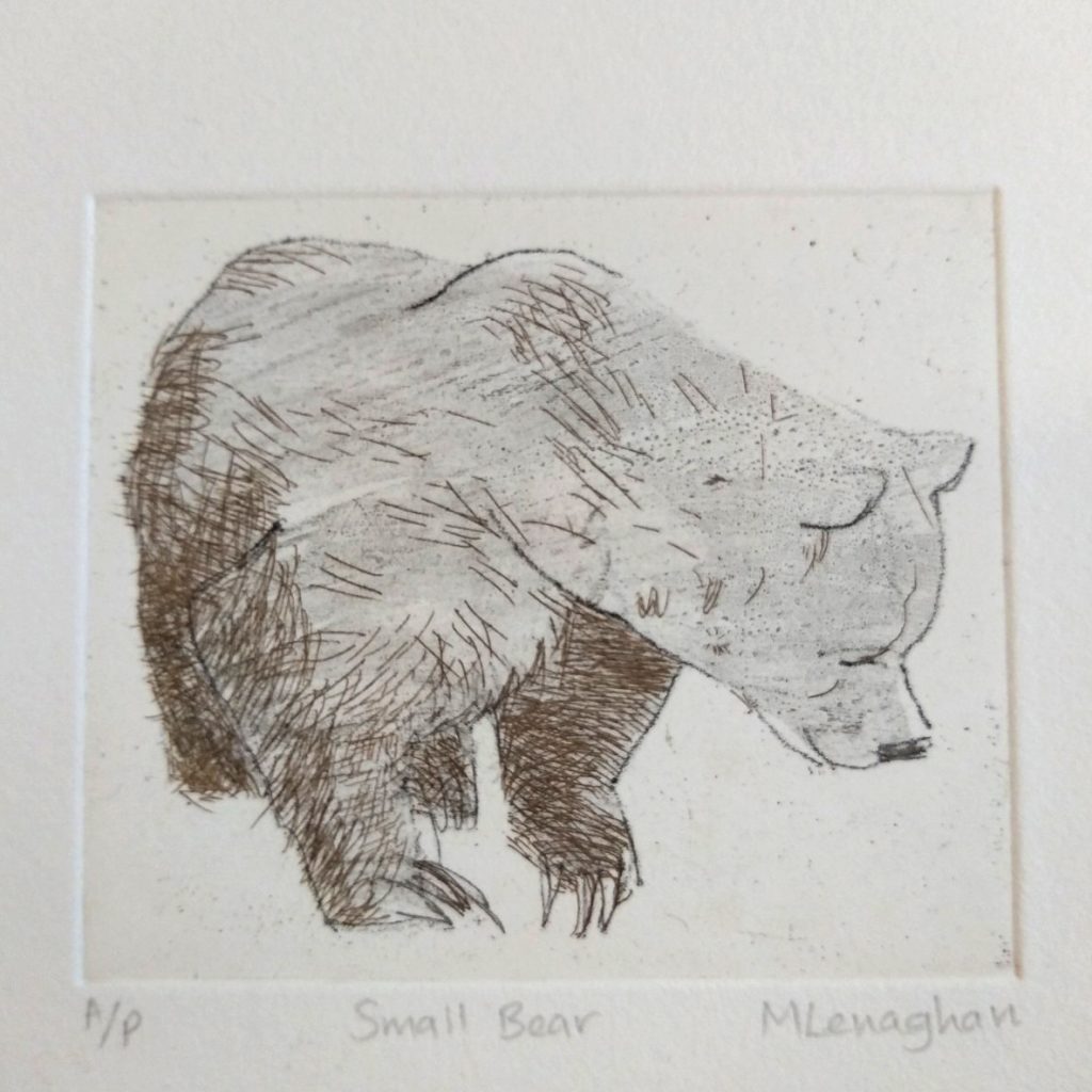 Small bear printed in grey and gold ink with hard and soft lines and a pale grey wash for texture